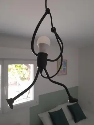Un ou plusieurs lits dans un hébergement de l'établissement Studio Cosy 15 m2 au fond du jardin