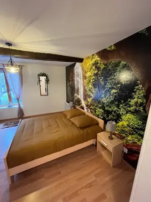 Un ou plusieurs lits dans un hébergement de l'établissement L'échappée Verte Ambiance Nature