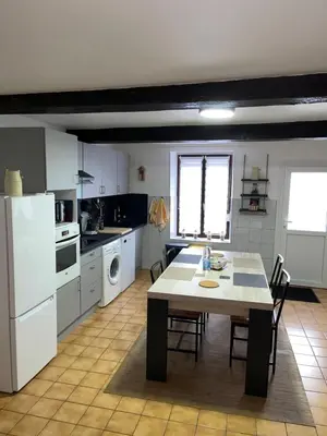 Cuisine ou kitchenette dans l'établissement L'échappée Verte Ambiance Nature