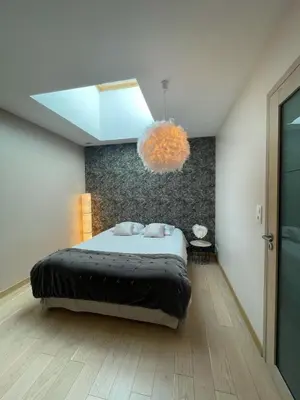 Un ou plusieurs lits dans un hébergement de l'établissement Loft avec Vue