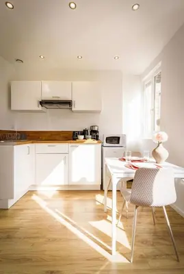 Cuisine ou kitchenette dans l'établissement Appartement Royal séjour, Parking gratuit