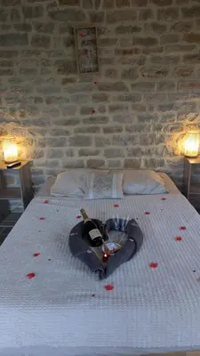 Un ou plusieurs lits dans un hébergement de l'établissement Gîte Bohème