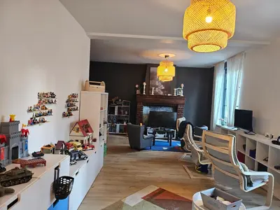 Coin salon dans l'établissement Joli cocon familial