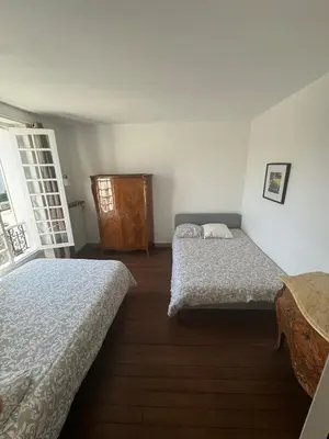 Un ou plusieurs lits dans un hébergement de l'établissement Grand Maison avec Piscine et Sauna