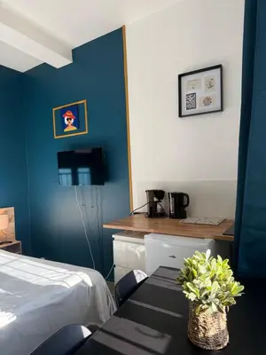 Un ou plusieurs lits dans un hébergement de l'établissement Studio SN3 - Centre-Ville Meaux - Proche Disneyland