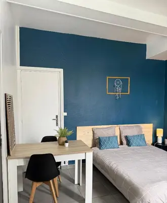 Un ou plusieurs lits dans un hébergement de l'établissement Studio SN4 - Centre-Ville Meaux - Proche Disneyland