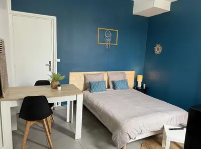 Un ou plusieurs lits dans un hébergement de l'établissement Studio SN4 - Centre-Ville Meaux - Proche Disneyland