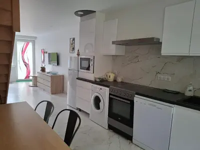 Cuisine ou kitchenette dans l'établissement Auxpetitsloups