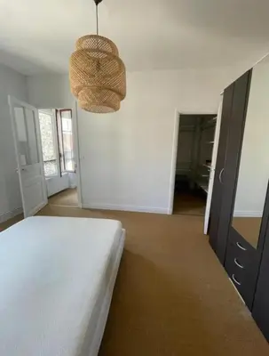 Un ou plusieurs lits dans un hébergement de l'établissement 2 bedroom Apartment Reims