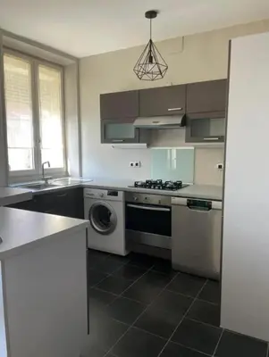 Cuisine ou kitchenette dans l'établissement 2 bedroom Apartment Reims