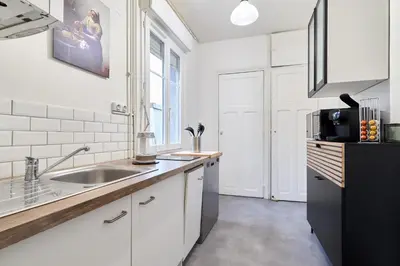 Cuisine ou kitchenette dans l'établissement Suite Vesle