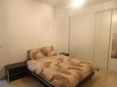 Un ou plusieurs lits dans un hébergement de l'établissement maison spacieuse à coulommiers 8 couchages