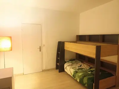 Un ou plusieurs lits dans un hébergement de l'établissement maison spacieuse à coulommiers 8 couchages
