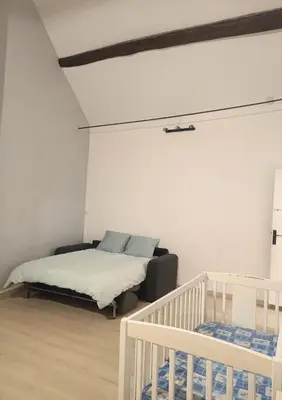 Un ou plusieurs lits dans un hébergement de l'établissement maison spacieuse à coulommiers 8 couchages