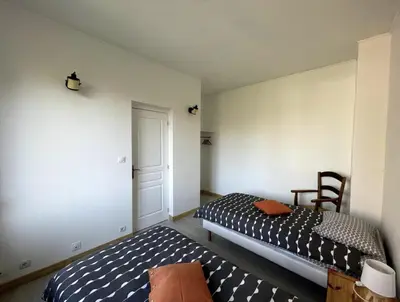 Un ou plusieurs lits dans un hébergement de l'établissement Au gîte du Roy
