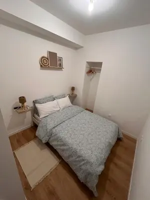 Un ou plusieurs lits dans un hébergement de l'établissement Serenity Stay