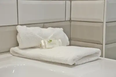 Un ou plusieurs lits dans un hébergement de l'établissement Excellence - 4 bedrooms