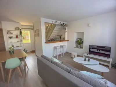 Coin salon dans l'établissement New Lovely cosy house with garden