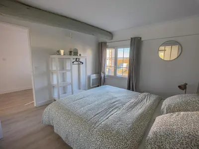 Un ou plusieurs lits dans un hébergement de l'établissement New Lovely cosy house with garden
