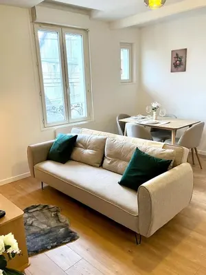 Coin salon dans l'établissement Cozy Margny - Neuf, Calme, Haut Débit & SmartTV