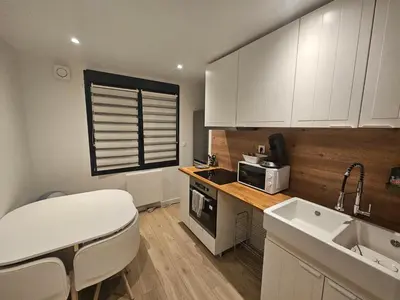 Cuisine ou kitchenette dans l'établissement Appartement 75m2 neuf 15 min centre ville