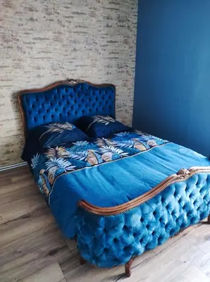 Un ou plusieurs lits dans un hébergement de l'établissement Appartement 4 personnes proche du château fort