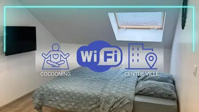 Un ou plusieurs lits dans un hébergement de l'établissement Confortable Studio - Centre ville