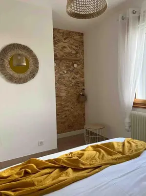 Un ou plusieurs lits dans un hébergement de l'établissement La ferme du bois