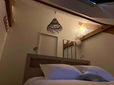 Un ou plusieurs lits dans un hébergement de l'établissement La ferme du bois
