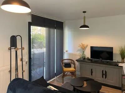 Télévision ou salle de divertissement dans l'établissement Gîte des Coteaux Sézannais