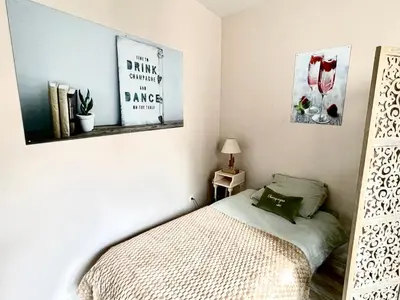 Un ou plusieurs lits dans un hébergement de l'établissement Le Lodge Champenois