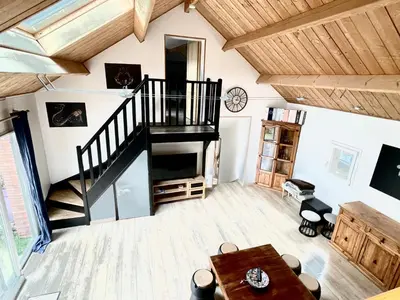 Télévision ou salle de divertissement dans l'établissement Le Lodge Champenois