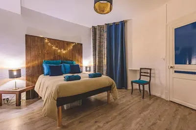 Un ou plusieurs lits dans un hébergement de l'établissement Azul Cosy charmant proche centre