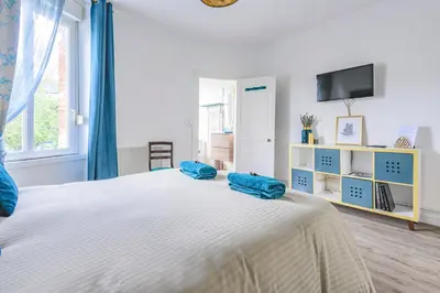 Un ou plusieurs lits dans un hébergement de l'établissement Azul Cosy charmant proche centre