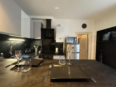 Cuisine ou kitchenette dans l'établissement L'Effervescence