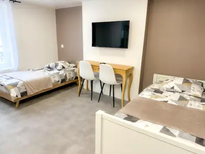 Un ou plusieurs lits dans un hébergement de l'établissement Studio B4 - Centre-Ville Meaux - Proche Disneyland
