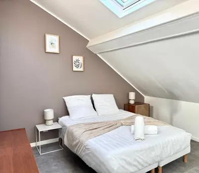 Un ou plusieurs lits dans un hébergement de l'établissement Studio B7 - Centre-Ville Meaux - Proche Disneyland