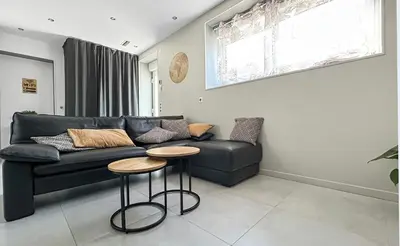 Coin salon dans l'établissement Maison cosy avec jardin & piscine chauffée