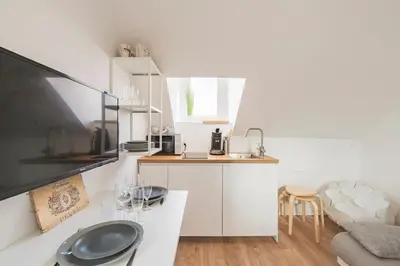 Cuisine ou kitchenette dans l'établissement CELIAN,centre Reims pour 4 pers
