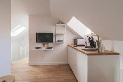 Cuisine ou kitchenette dans l'établissement CELIAN,centre Reims pour 4 pers