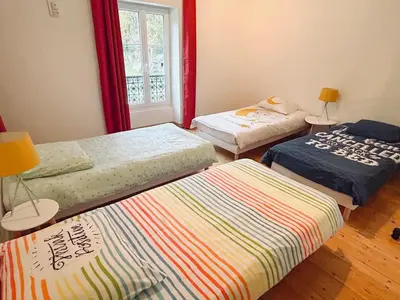 Un ou plusieurs lits dans un hébergement de l'établissement Domaine l'Ermitage Nature & Loisirs, Billard, WiFi, BBQ et Détente