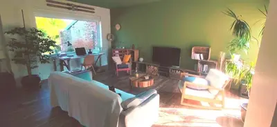 Coin salon dans l'établissement Chambre Privée chez Guillaume