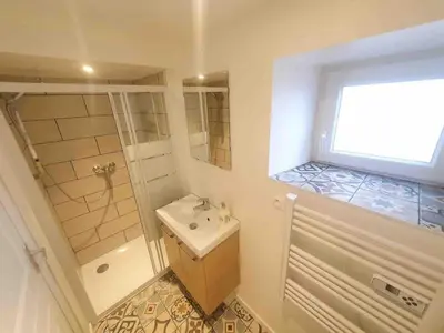 Salle de bains dans l'établissement Le Petite Maison