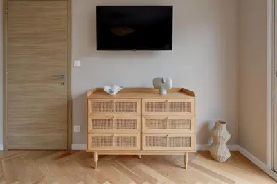 Télévision ou salle de divertissement dans l'établissement Ô Plaisir des Sens - au cœur du vignoble champenois