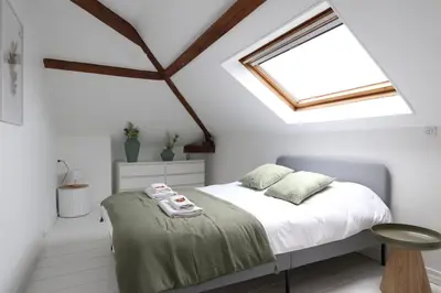 Un ou plusieurs lits dans un hébergement de l'établissement E Le clos des lumières, maison 13 pers avec jardin