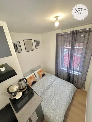 Un ou plusieurs lits dans un hébergement de l'établissement Cosy Studio 4 - Serene Escape