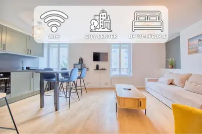 Télévision ou salle de divertissement dans l'établissement Le Barbusse