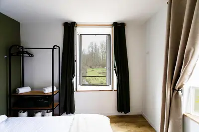 Un ou plusieurs lits dans un hébergement de l'établissement La Clouterie - Face au ruisseau piscine privée