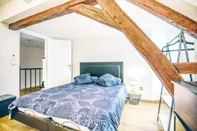 Un ou plusieurs lits dans un hébergement de l'établissement Suite Premium 4 étoiles, spacieux avec sauna et extérieur