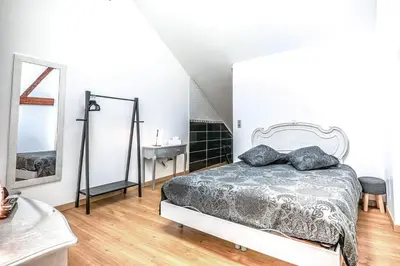 Un ou plusieurs lits dans un hébergement de l'établissement Suite Edouard - 4 étoiles, spacieux avec sauna et extérieur